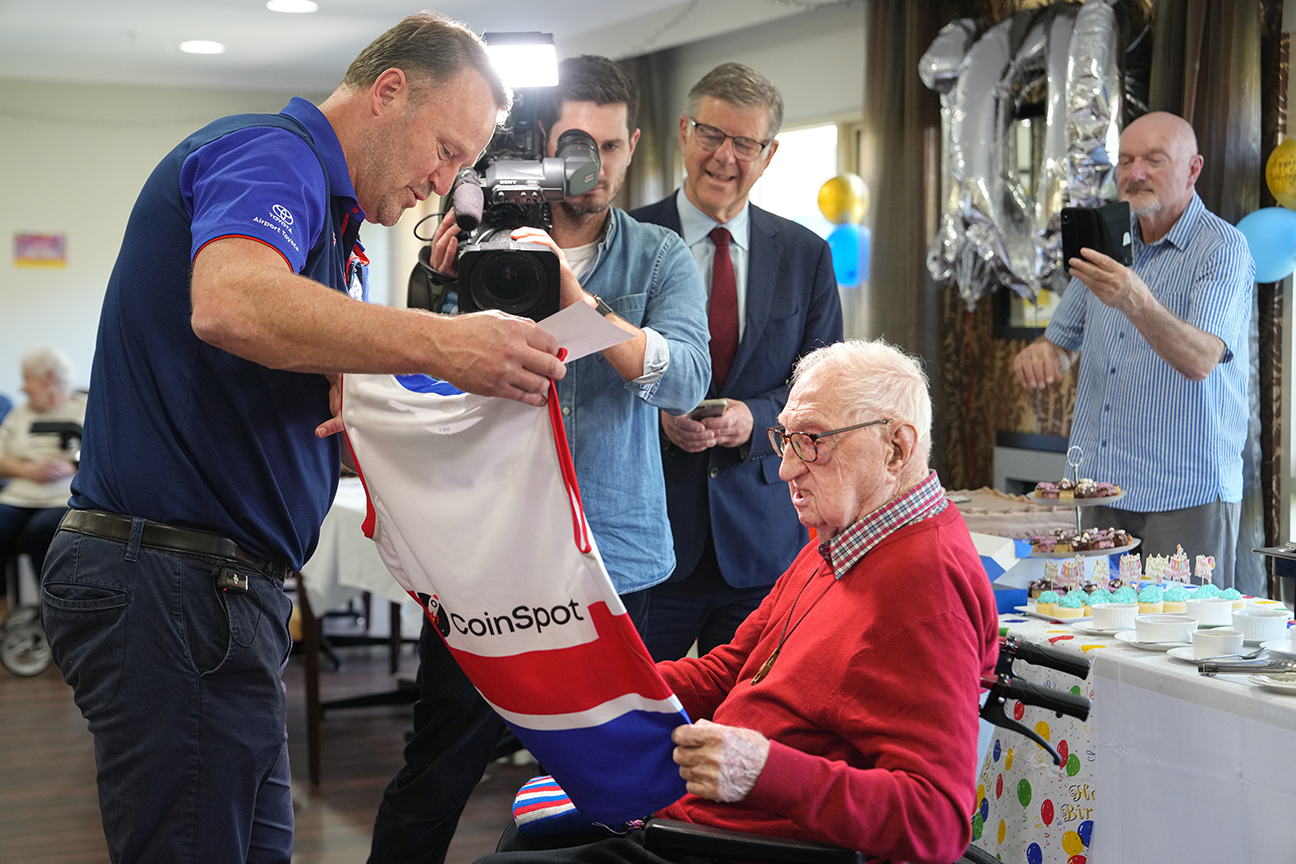 Victoria's Oldest Man. We celebrated Rev. Bill's 109 Birthday with a Special celebration shared with friends, family and a Special Guest - Chris Grant from the Western Bulldogs with a lovely presentation of a signed jumper and scarf which was all captured by Channel 7 News.